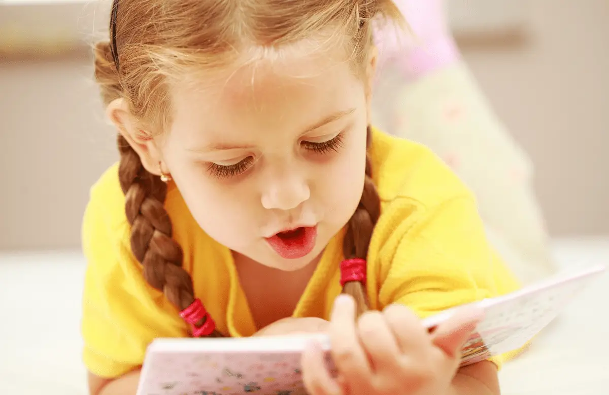 Young girl reading a book