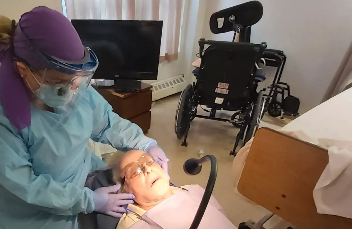 Elderly dental patient treated by Dental Care in Motion